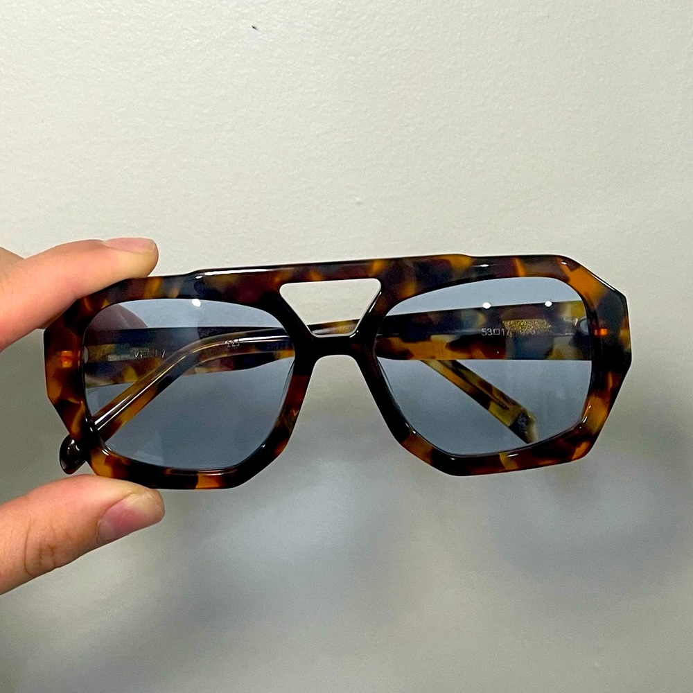 Vehla sunglasses. Tortoise shell with blue frames. Brand new!!  Never worn!!